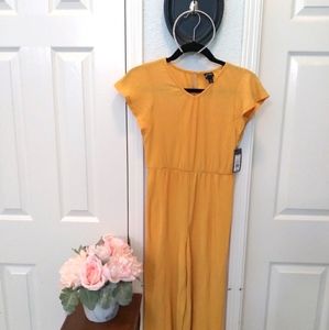 Girls golden yellow jumpsuit size L 10/12
